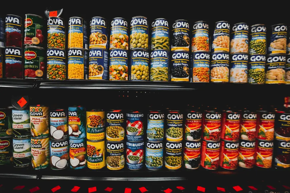 Cans of food on store shelf
