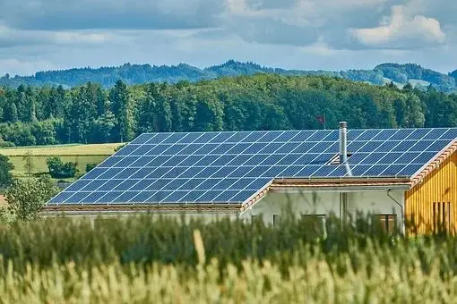 Rooftop solar panels in a field