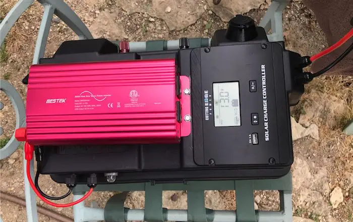 Charge controller and AC inverter on solar generator outside